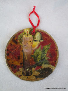 Sottobicchiere con candela e vischio